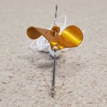 Baby Buzzbait Gold precisely cupped and pitched prop is great for stained water.